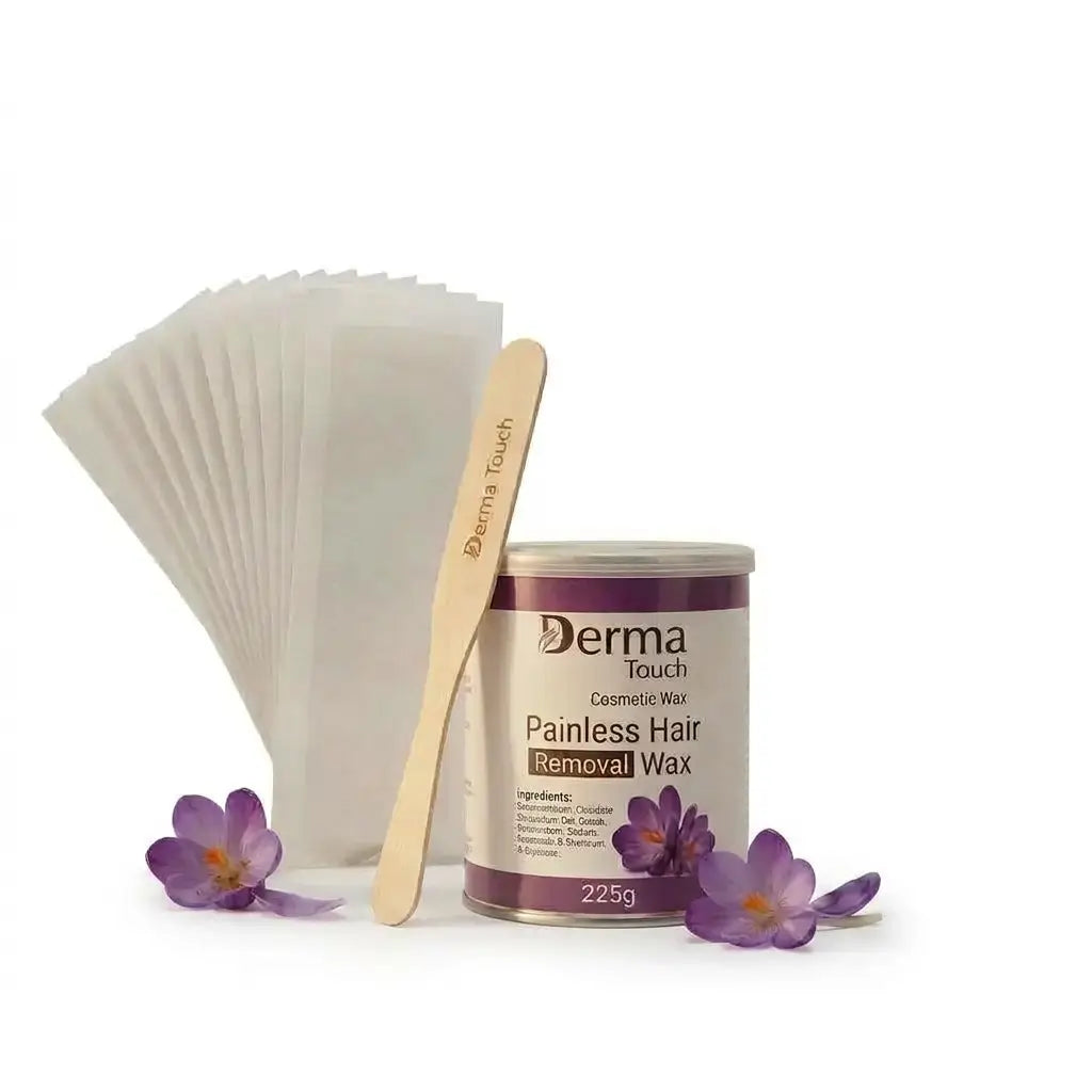 Derma Touch Painless Hair Removal Wax kit including a metal canister of wax, a wooden spatula, a fan of white removal patches, styled with purple crocuses on a white background.